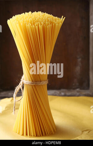 Bunch of raw spaghetti, food closeup Stock Photo