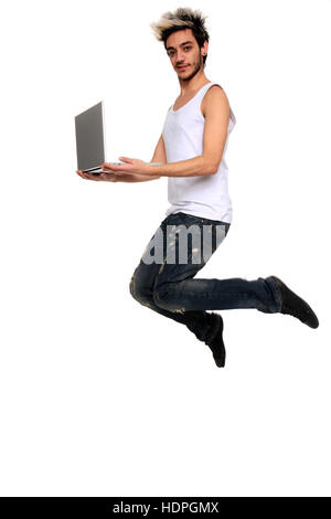 young man in the air holding a notebook isolated on a white background Stock Photo