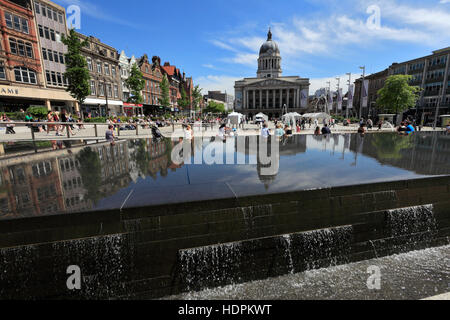 The Council building reflected in the infinity pool, and fountains, Old Market Square, Nottingham city centre, Nottinghamshire Stock Photo