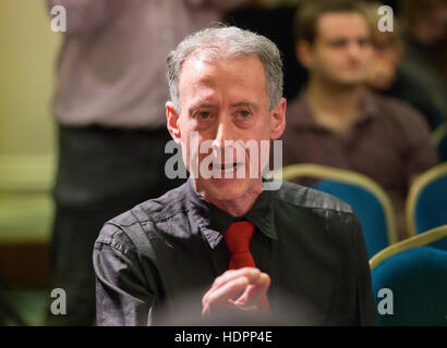 Human rights campaigner,Peter Tatchell,heckles Jeremy Corbyn,during his speech on Human Rights and demands air drops in Syria Stock Photo