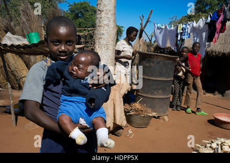 Inhabitants of Mukuna Village. In the Kazungula District of Southern Province lies the rural Mukuni Village. It is just seven kilometres from the worl Stock Photo