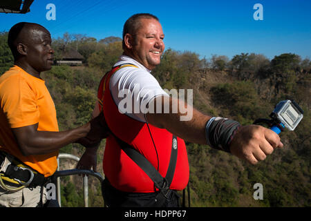 Bungee Jumping at Victoria Falls. Even though we never entertained the thought of doing this, we literally witnessed people doing the big dive from th Stock Photo