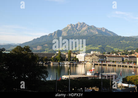 Mount Pilatus towering over Lucerne, Switzerland on a beautiful summer's day. Stock Photo