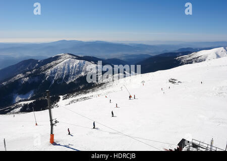 Skiers on the south side of Mount Chopok, Low Tatras, Slovakia. Stock Photo