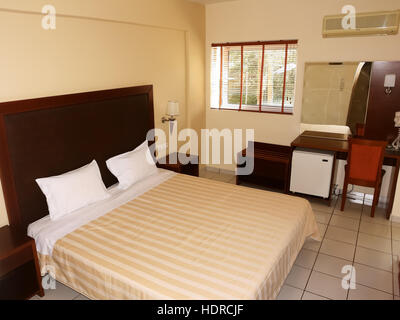 Sivota, GREECE, May 09, 2013: Stylish interior of bedroom in a small town on the coast of the Ionian Sea in Greece. Stock Photo