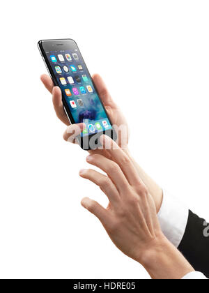 Woman hands holding Apple iPhone 7 Plus smartphone isolated on white background Stock Photo