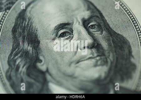 Dollars closeup. Benjamin Franklin's portrait on one hundred dollar bill Stock Photo