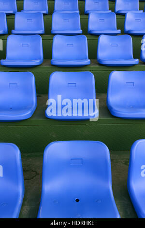 lines of blue stadium seats vertical composition Stock Photo