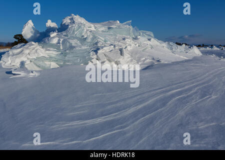Snow-covered ice hummocks of Lake Baikal Stock Photo