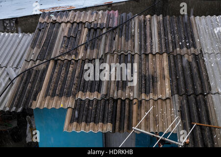 Asbestos roof tiles on a building in Baracoa, Cuba Stock Photo