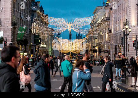 London, UK. 13th Dec, 2016. Christmas lights compositions in Regent Street and Mayfair. The 2016 display is a throwback to Regent Street's first set of Christmas lights, which went up in 1954. The decorations will form one part of a wider display that will run all the way from Oxford Circus to Waterloo Place via Piccadilly and St James's. Credit:  Alberto Pezzali/Pacific Press/Alamy Live News Stock Photo