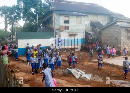 Students waiting for the school to begin in Freetown, Sierra Leone Stock Photo