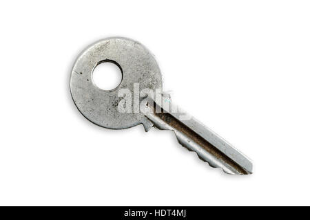 Scratched and ruined old modern key, isolated on white background Stock Photo