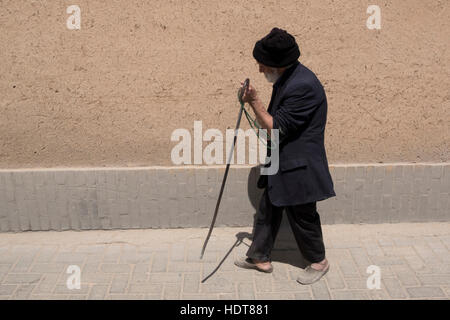 A blind man walks through the bazaar in Yadz, Yazd Province, Iran Stock Photo
