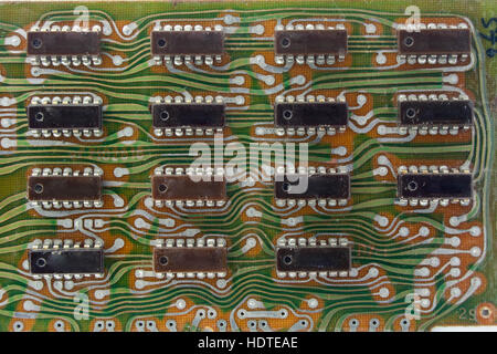 old printed circuit board with microchips Stock Photo