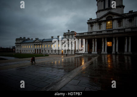 Greenwich, London England UK. Dec 2016 The Old Royal Naval College now the University of Greenwich at dusk in the rain. Now used as a London film set. Stock Photo