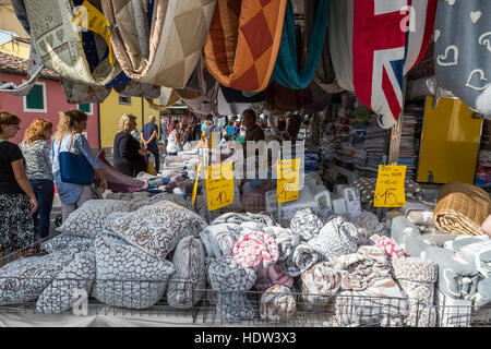 Lucca city street market stretches from the Porta Santa Maria along the Via Borga Giannotti with everything from food to pets. Stock Photo