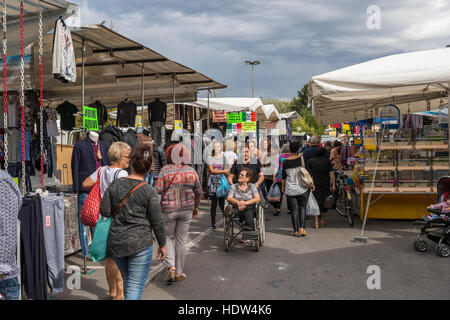 Lucca city street market stretches from the Porta Santa Maria along the Via Borga Giannotti with everything from food to pets. Stock Photo