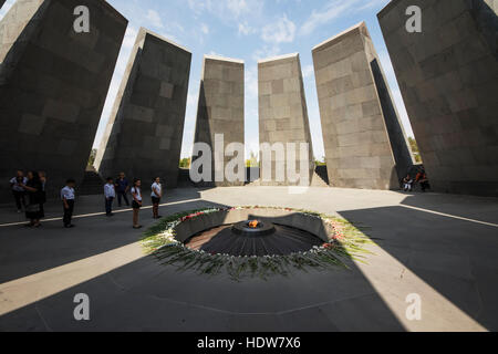 School Children Standing By The Eternal Flame Dedicated To The 1.5 Million People Killed During The Armenian Genocide In The Armenian Genocide Memo... Stock Photo