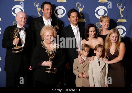 The cast from 'Everybody Loves Raymond', which won the award for outstanding comedy series at the 57th Annual Emmy Awards at the Shrine Auditorium in Los Angeles, September 18, 2005. From left to right are actors, Peter Boyle, Brad Garrett, Doris Roberts, Ray Romano, Sawyer and Sullivan Sweeten, Patricia Heaton, Monica Horan, and Madylin Sweeten. Photo by Francis Specker Stock Photo