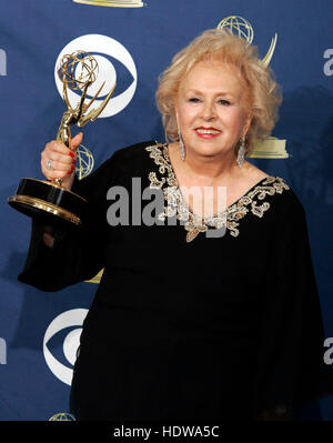 Actress Doris Roberts holds her award for outstanding supporting actress in a comedy series for 'Everybody Loves Raymond' at the 57th Annual Emmy Awards at the Shrine Auditorium in Los Angeles, September 18, 2005. Photo by Francis Specker Stock Photo