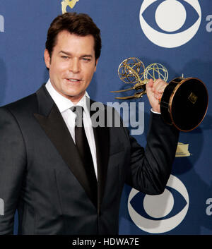 Actor Ray Liotta holds his award for outstanding guest actor in a drama series for 'ER' at the 57th Annual Emmy Awards at the Shrine Auditorium in Los Angeles, September 18, 2005. Photo by Francis Specker Stock Photo