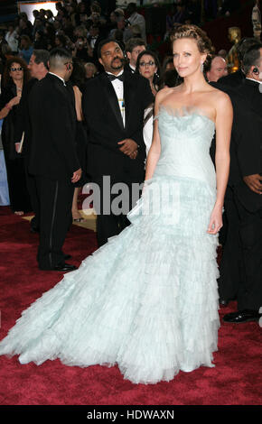 Charlize Theron arrives at the 77th Annual Academy Awards  in Los Angeles on Feb. 21, 2005. Photo credit: Francis Specker Stock Photo