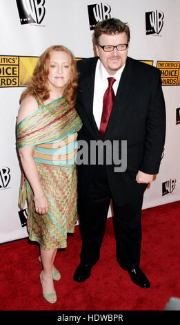 Director Michael Moore and his wife, Kathleen, arrive at the 10th Annual Critics' Choice Awards in Los Angeles on January 10, 2005.Photo by Francis Specker Stock Photo