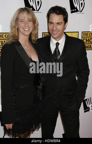 Eric McCormack and his wife, Janet Holden, arrive at the 10th Annual Critic's Choice Awards in Los Angeles, California on Sunday January 10, 2005. Photo credit: Francis Specker Stock Photo