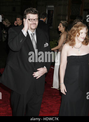 Director Michael Moore and his wife Kathleen arrive at the People's Choice Awards in Pasadena, California on Sunday January 9, 2005. Photo credit: Francis Specker Stock Photo