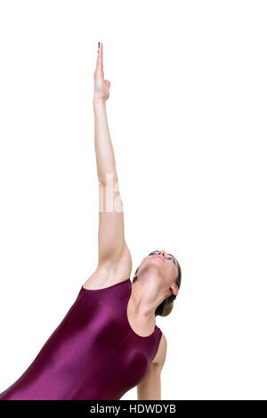 Pretty young woman practicing yoga at side plank on the knee pose in the studio Stock Photo