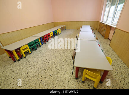 lunchroom nursery with tables and small chairs for children Stock Photo