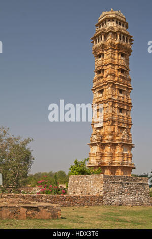 Ornate carved stone tower, Vijay Stambha, built to celebrate an ancient victory. Chittaugarh Fort, Rajasthan, India. Stock Photo