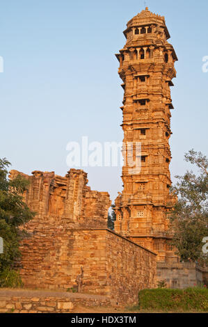 Ornate carved stone victory tower (Vijay Stambha) built to celebrate an ancient victory. Chittaugarh, Rajasthan, India. Stock Photo