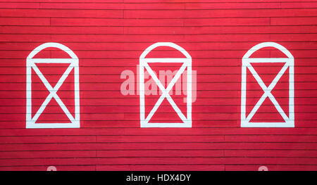 Background image of a wooden wall painted in bright red and white color Stock Photo