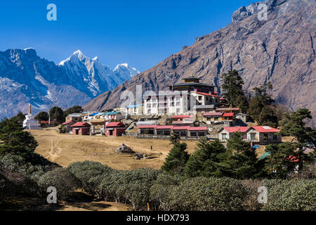 The monastery Tengboche Gompa is located on a ridge high above the valley on 3850m altitude Stock Photo