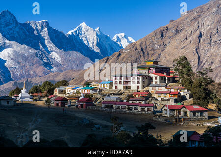 The monastery Tengboche Gompa is located on a ridge high above the valley on 3850m altitude Stock Photo