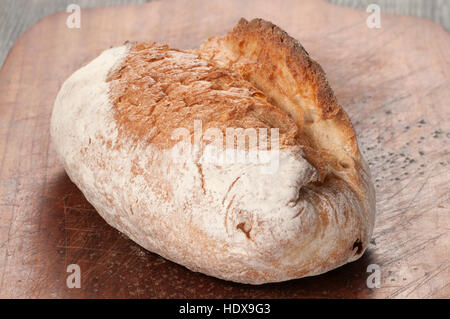 Lyonese quick bread on a timber board, close up Stock Photo