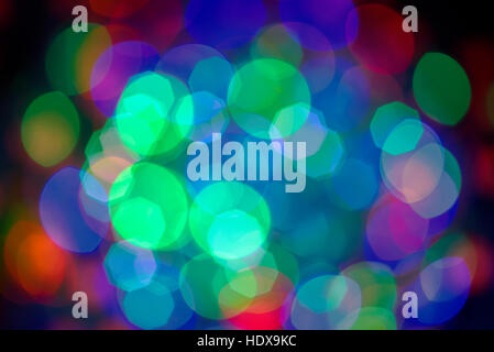 Defocussed Christmas colourful lights. Stock Photo