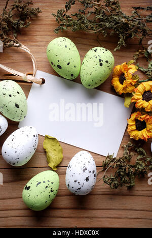 Easter greeting card with decorated eggs around Stock Photo