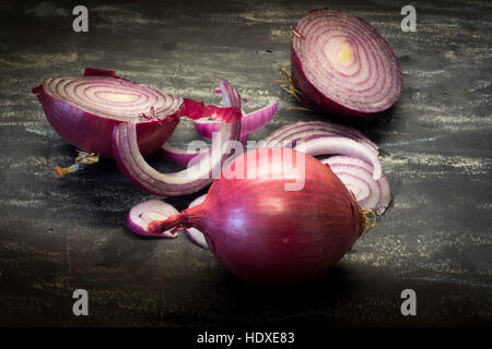 Red onion on black background. Organic food. Vegetarian concept. Stock Photo