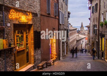 View down street 'Via Raffaello' in Urbino, a walled medieval city in the Marche region of Italy. Stock Photo