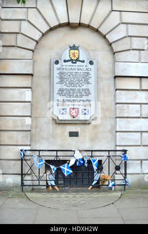 London England, UK. Memorial to Sir William Wallace on the outer wall of St Bart's Hospital, Smithfield.... Stock Photo