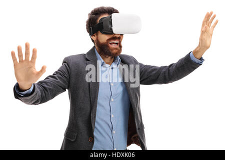 Bearded young man using a VR headset isolated on white background Stock Photo