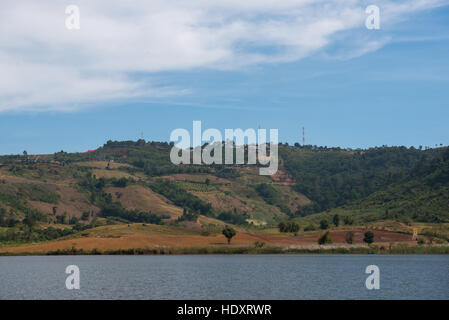 forest damage from human in the front river and have soil only on mountain Stock Photo