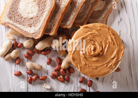 peanut butter and fresh bread close-up horizontal view from above Stock Photo