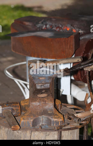 Tools of a blacksmith at work, close-up, vertical Stock Photo