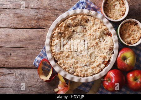 Traditional apple crisp close-up in baking dish. view from above horizontal, rustic style Stock Photo