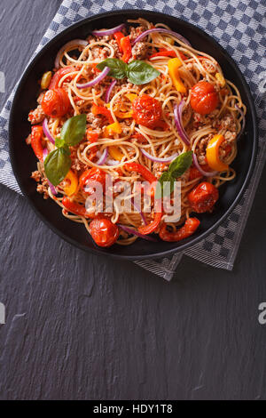 Italian spaghetti with minced meat and vegetables. vertical top view Stock Photo