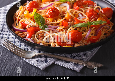 Delicious spaghetti with minced meat and vegetables close-up. horizontal Stock Photo
